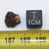 Impactite du cratère de Monturaqui dans une boite (Chili - 0.54 gramme - 003 **)