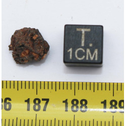 Impactite du cratère de Monturaqui dans une boite (Chili - 0.54 gramme - 003 **)