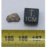 Météorite Lunaire Laâyoune 002 dans une boite Feld Breccia (Maroc - 0.202 gramme - 053**)