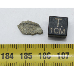 Tranche de Météorite NWA 12241 dans une boite - Martienne Achondrite Shergottite (Algérie -  0.544 gramme - 008 **)