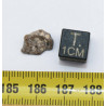 Météorite lunaire Laâyoune 002 dans une boite Feld Breccia (Maroc - 0.254 gramme 058**)