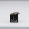 Météorite lunaire Laâyoune 002 dans une boite Feld Breccia (Maroc - 0.254 gramme 058**)