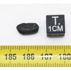 Tectite Atacamaite dans une boite (Chili - 0.54 gramme - 011 **)