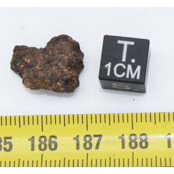 Impactite du cratère de Monturaqui dans une boite (Chili - 1.50 gramme - 005 **)