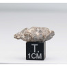 Météorite Lunaire Laâyoune 002 dans une boite Feld Breccia (Maroc - 2.48 grammes - 070 **)