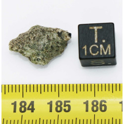 Fragment de trinitite dans une boite - Verre d Alamogordo ( USA - 0.80 grammes -  103 * )