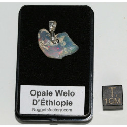 Pendentif en Opale Welo brute dans une boite ( 1.04 gramme - 028**)